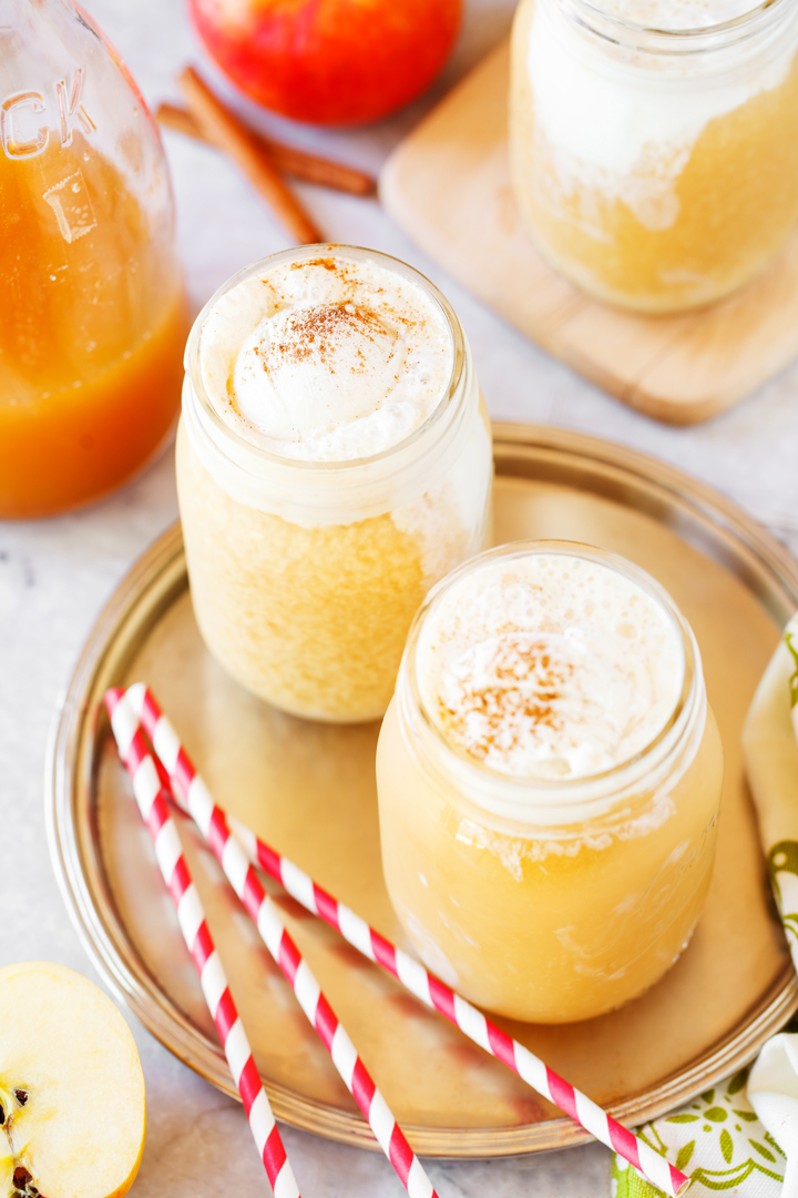 apple cider floats topped with cinnamon