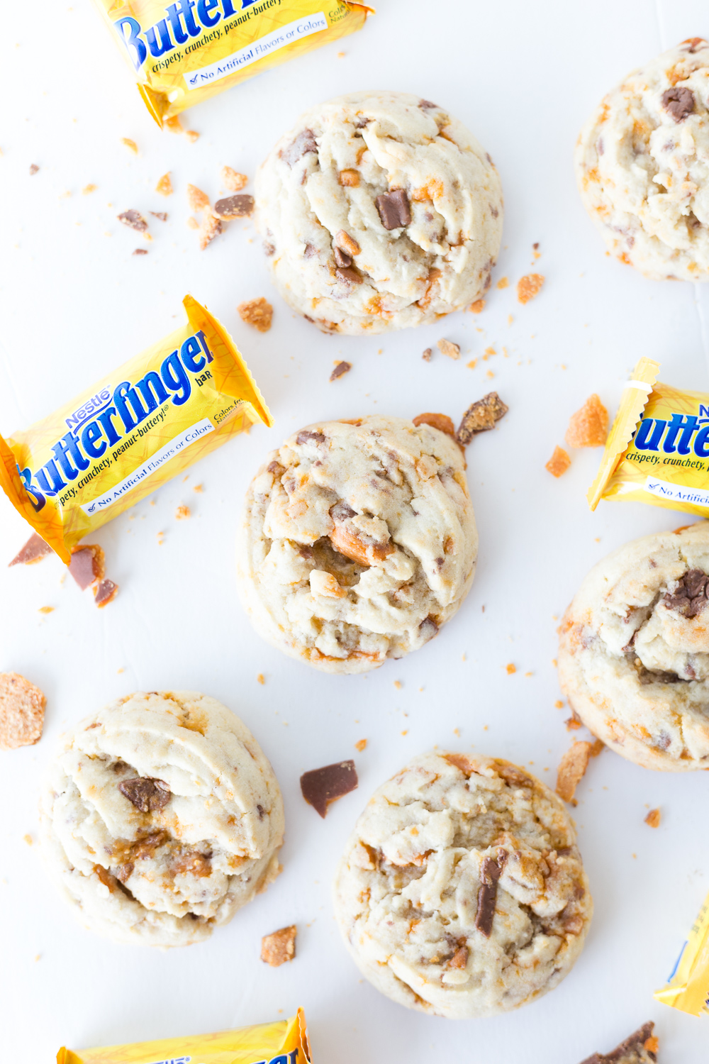 These Butterfinger cookies are soft, flavorful and delicious! They have a sweet taste and are filled with crunchy candy pieces! They are perfect for a Boo Basket. www.madetobeamomma.com