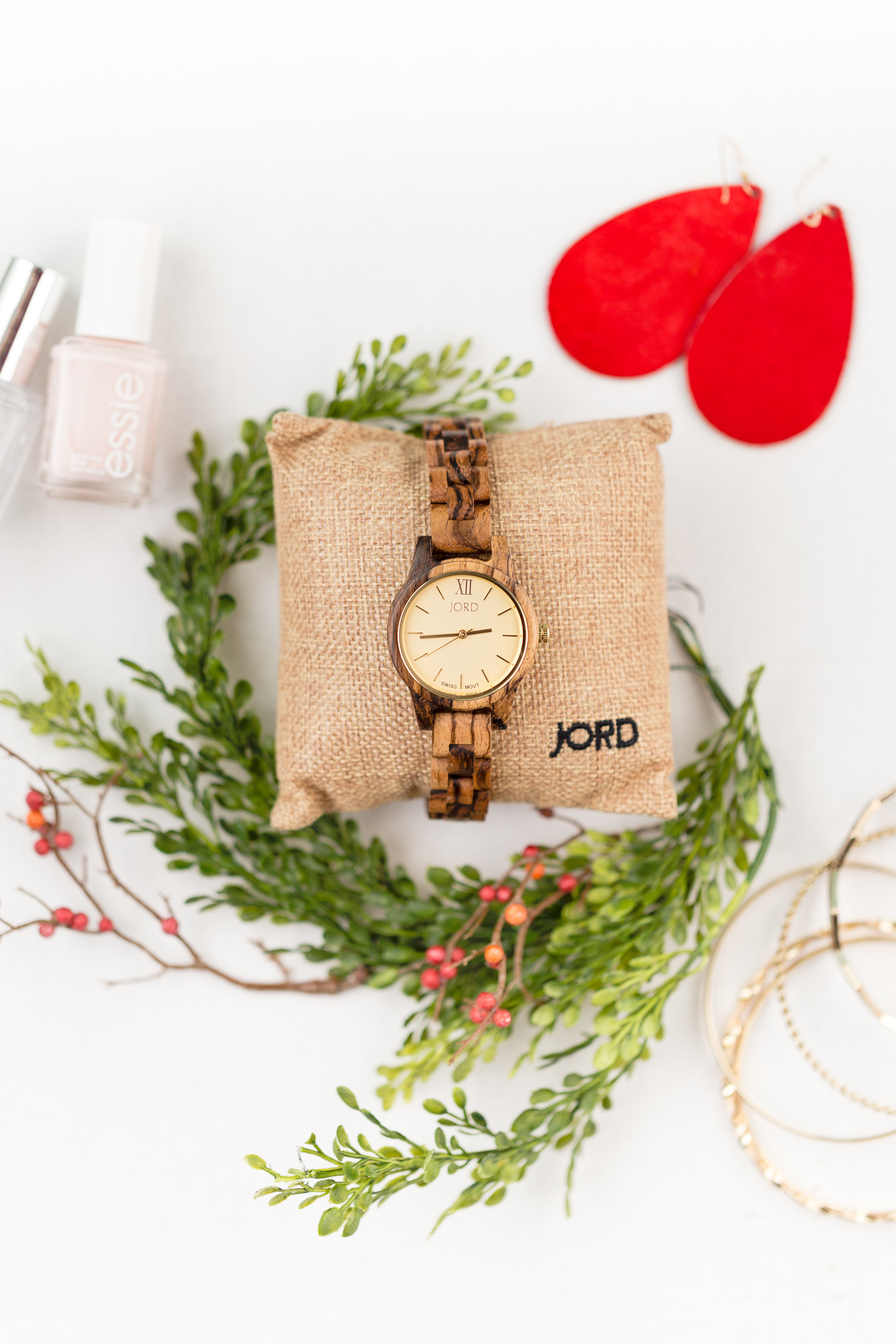 Holiday Gift Guide-Pretty Accessories: earrings, women's watch and nail polish are just a few of my favorite accessories that the ladies in your life are bound to en