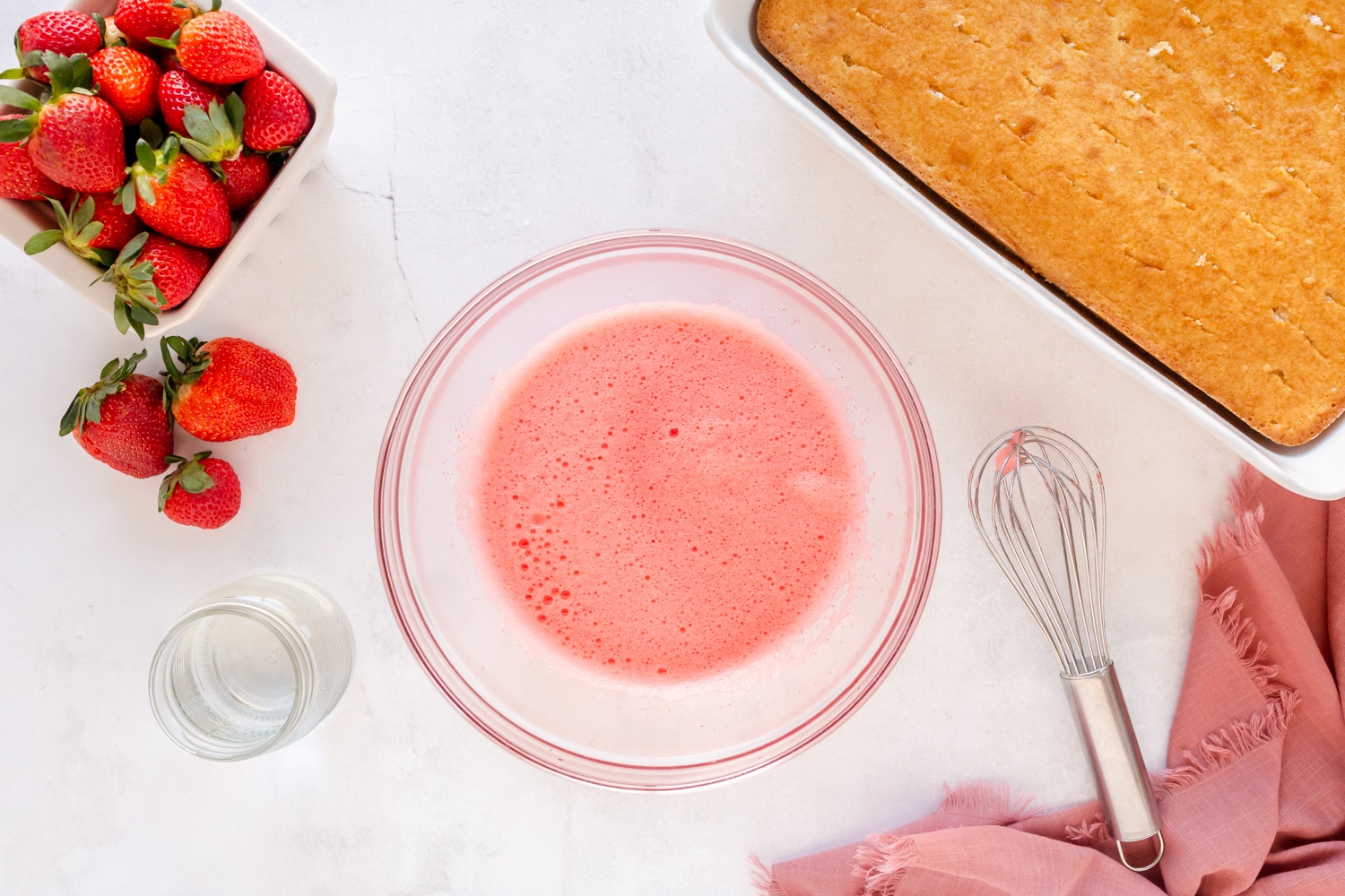 strawberry jello mixed in bowl