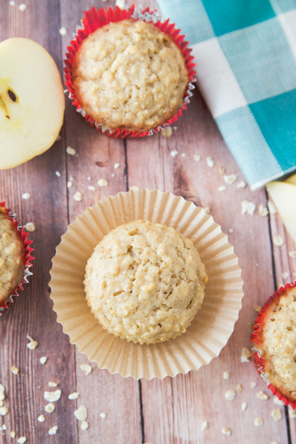 These Oat & Apple Muffins are the perfect breakfast muffin.  They have a touch of sweetness from the honey and apples and a hint of fall with the cinnamon spice.