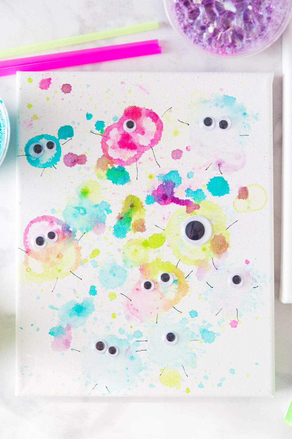 These Bubble Paint Monsters are such a fun way to play with paint! Fun paint colors, straws, and googly eyes make this a perfect craft for the kids! 