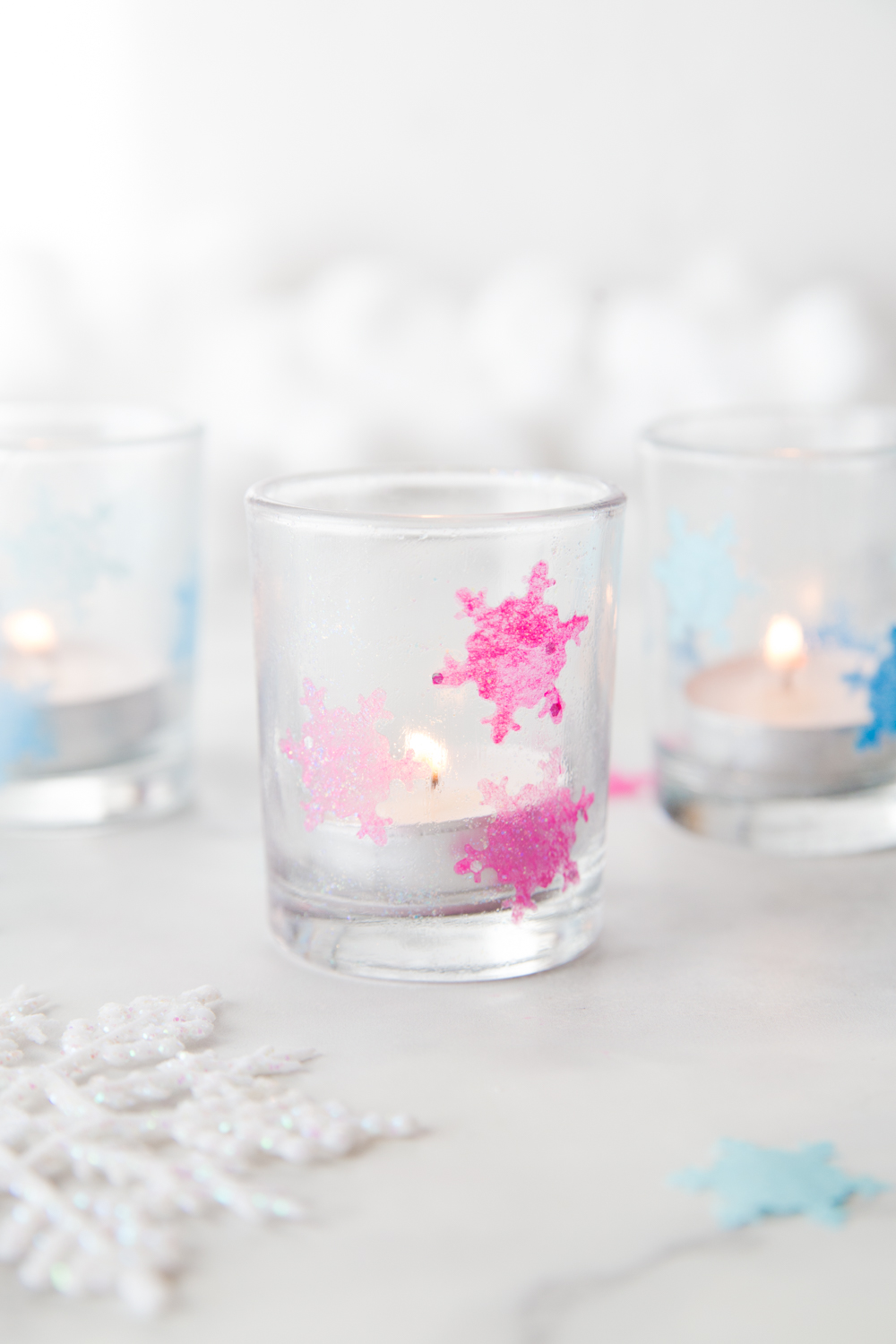 These Tissue Paper Snowflake Luminaries are a perfect and simple holiday craft. 