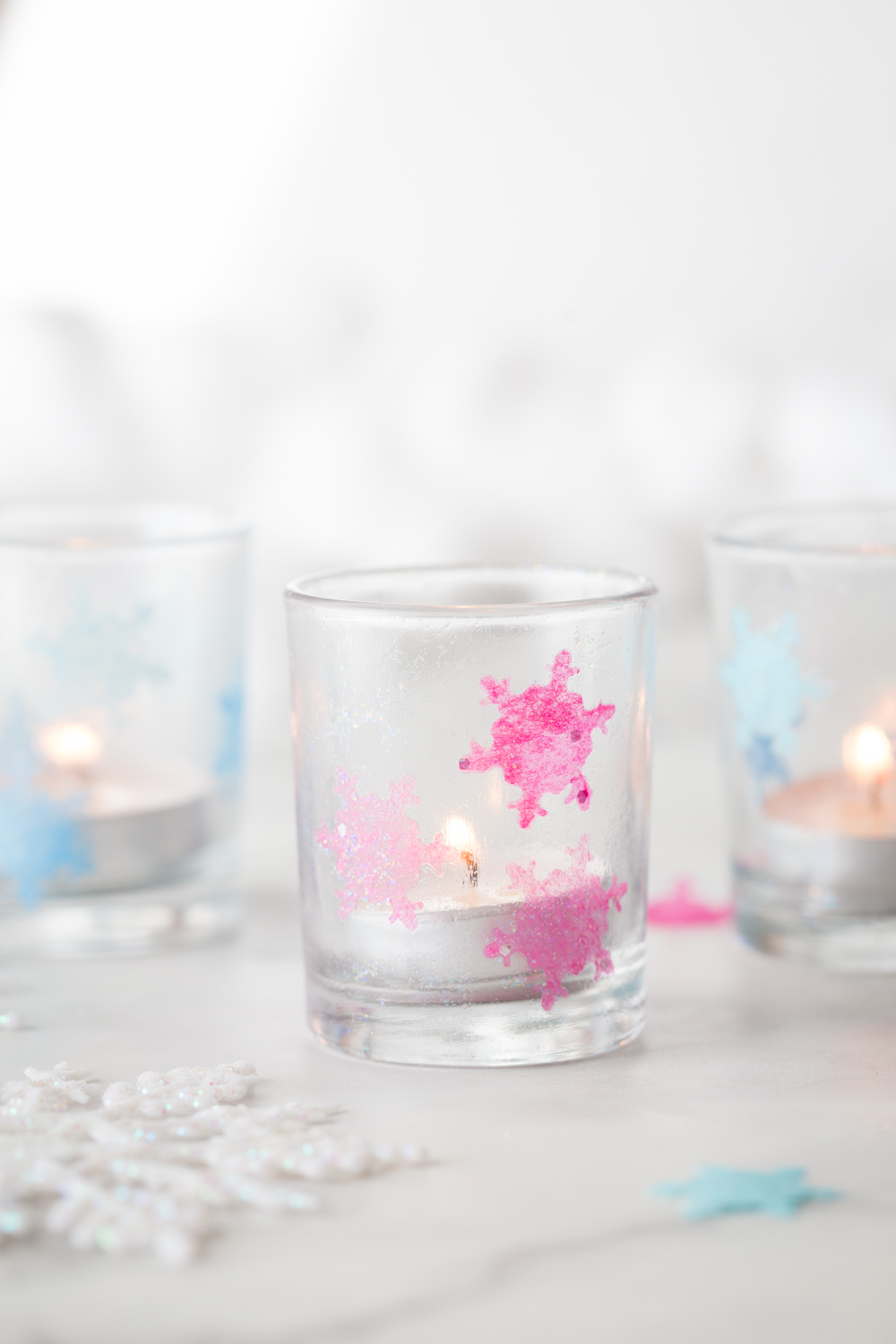 These Tissue Paper Snowflake Luminaries are a perfect and simple holiday craft. 