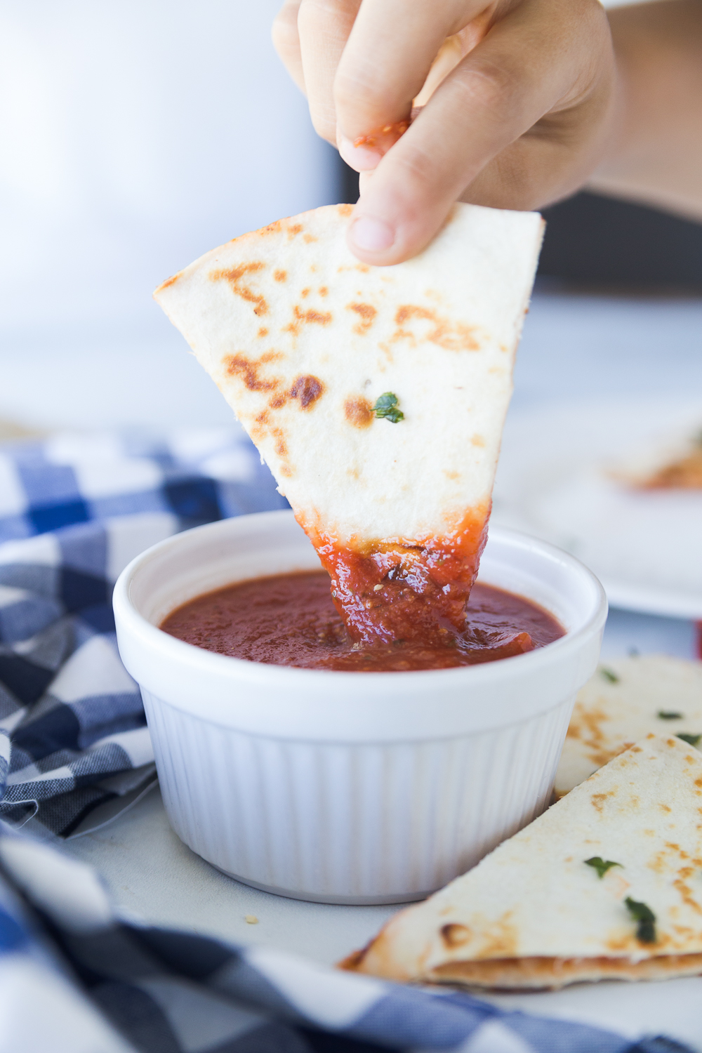 pizza quesadilla in dipping sauce
