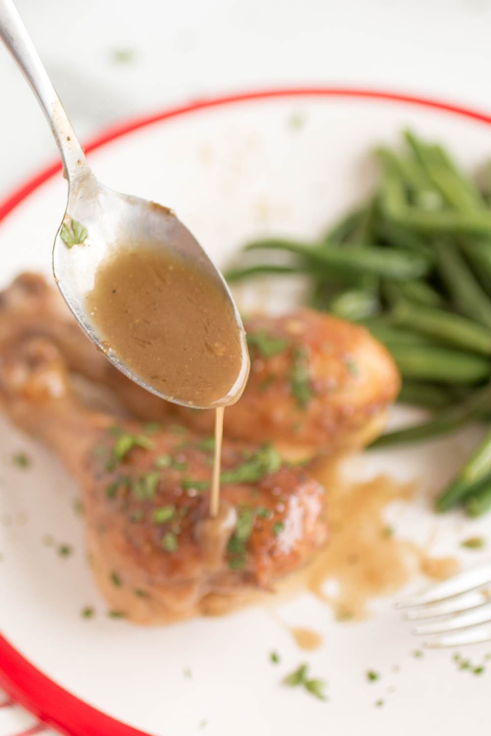 gravy pouring from spoon