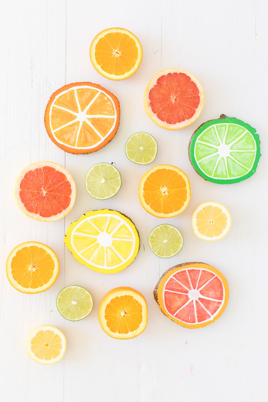 Citrus Wooden Coasters: a fun and easy DIY wooden coaster craft! The citrus designs are perfect for summertime. 