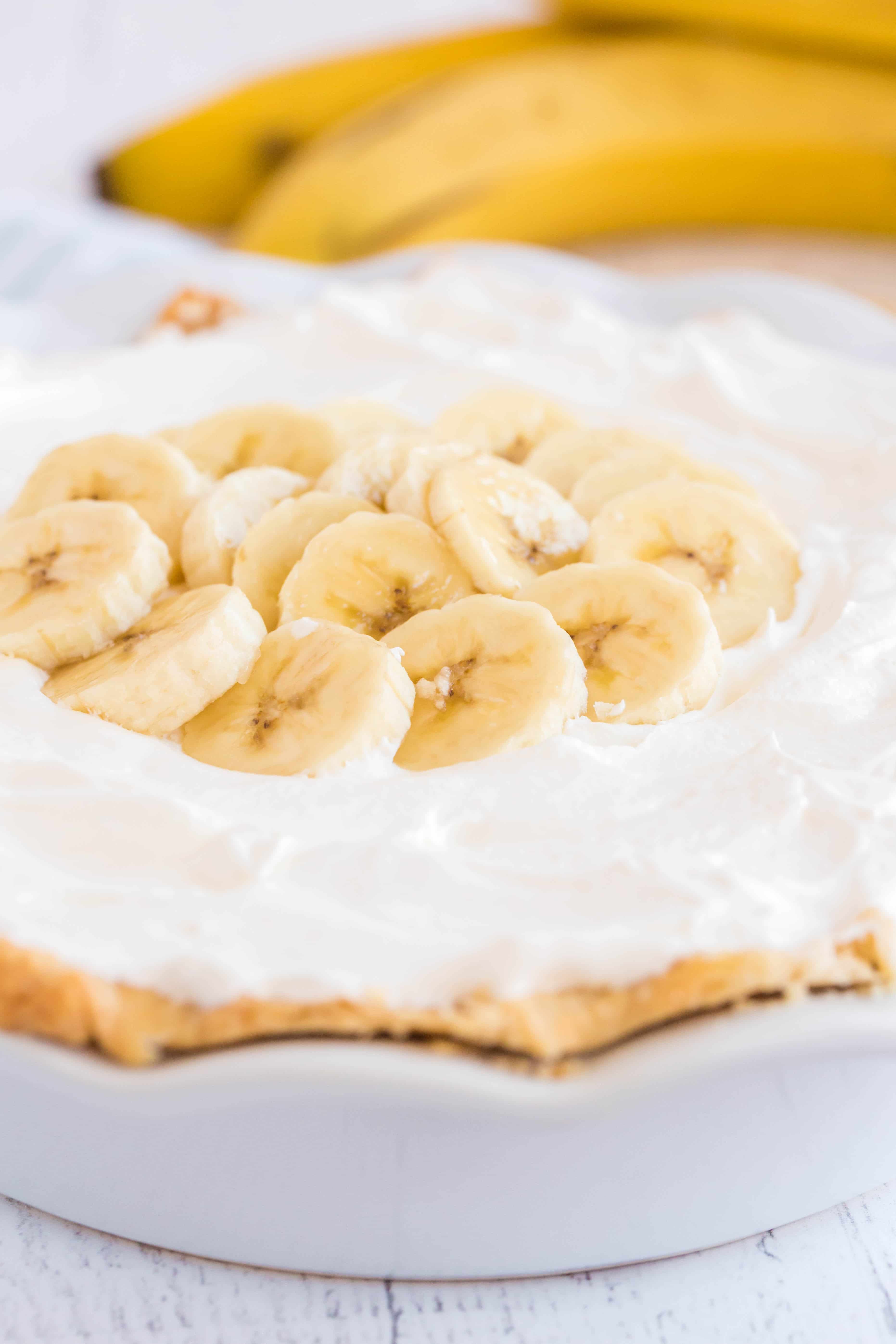Banana Cream Pie with Whipped Cream on Top and Sliced Bananas