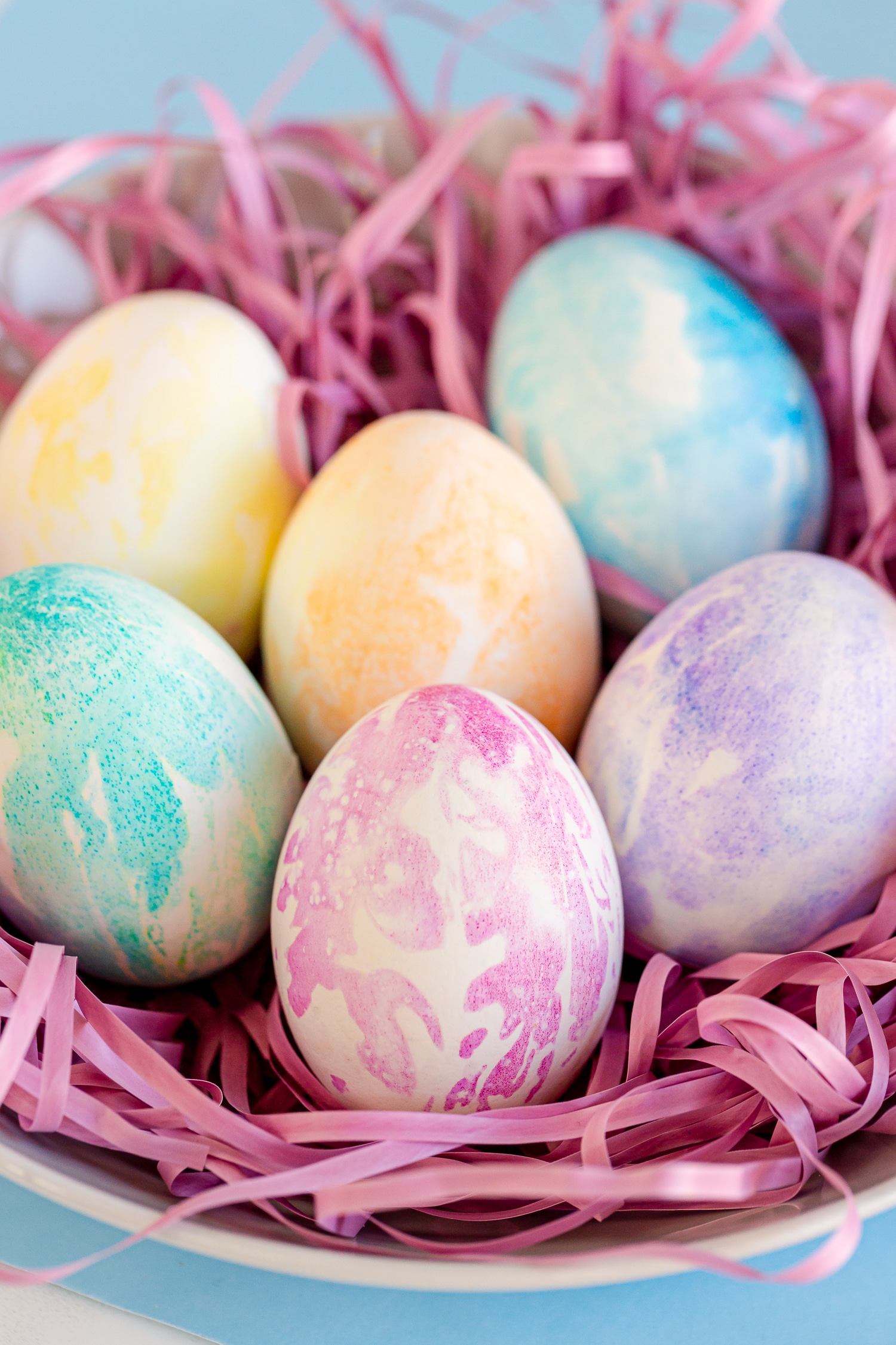 These Tie Dye Easter Eggs are a mess free fun Easter activity using markers and coffee filters! No vinegar or dyes needed!