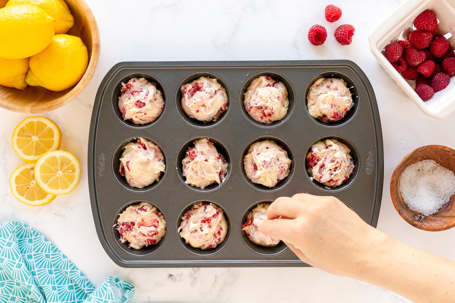 sprinkle coarse sugar on top of batter in muffin tin