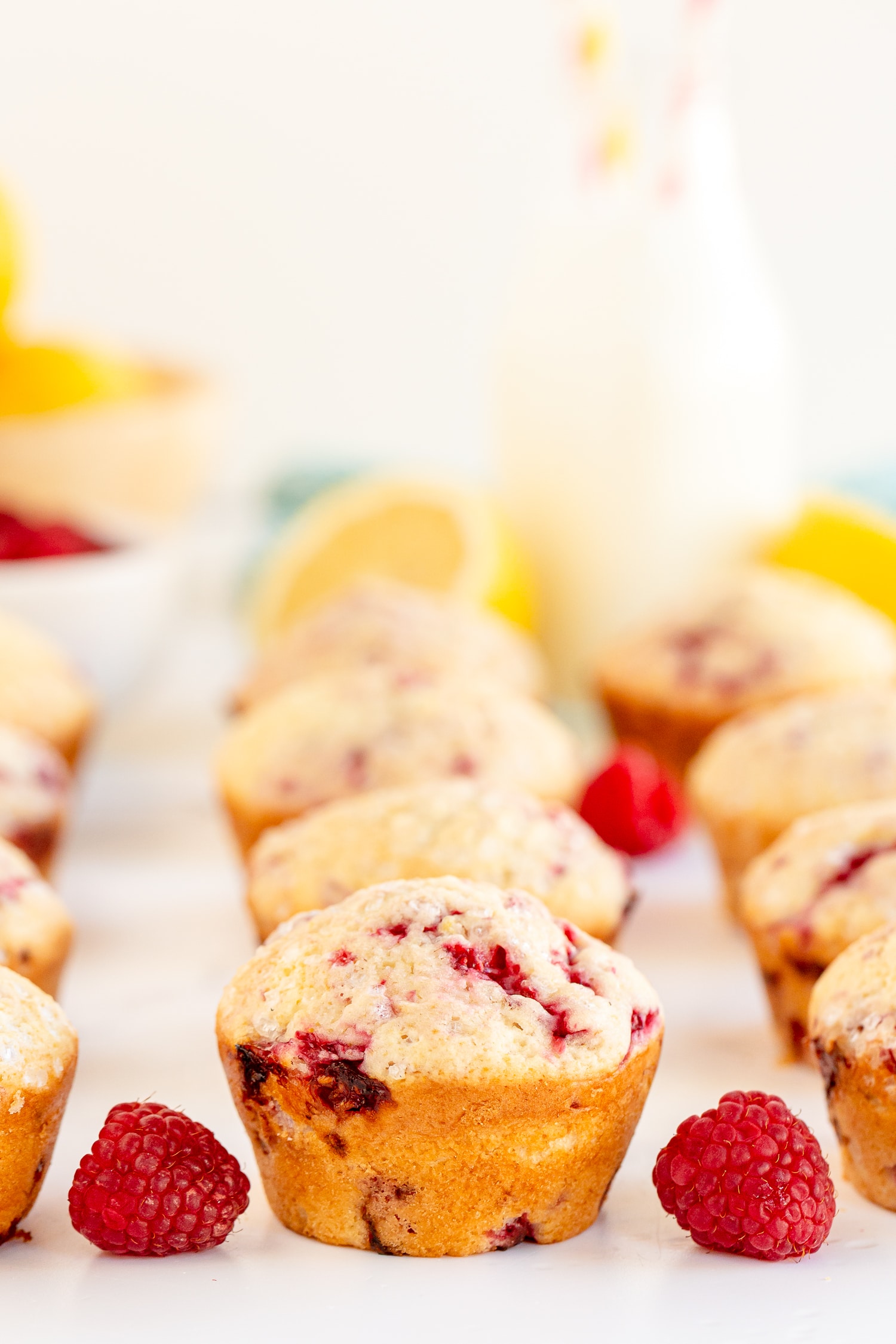 Lemon Raspberry Muffins on marble counter
