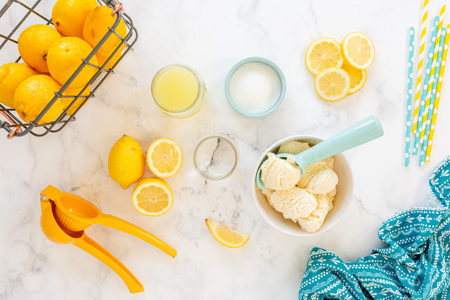ingredients needed on counter: lemons, vanilla ice cream, sugar and water