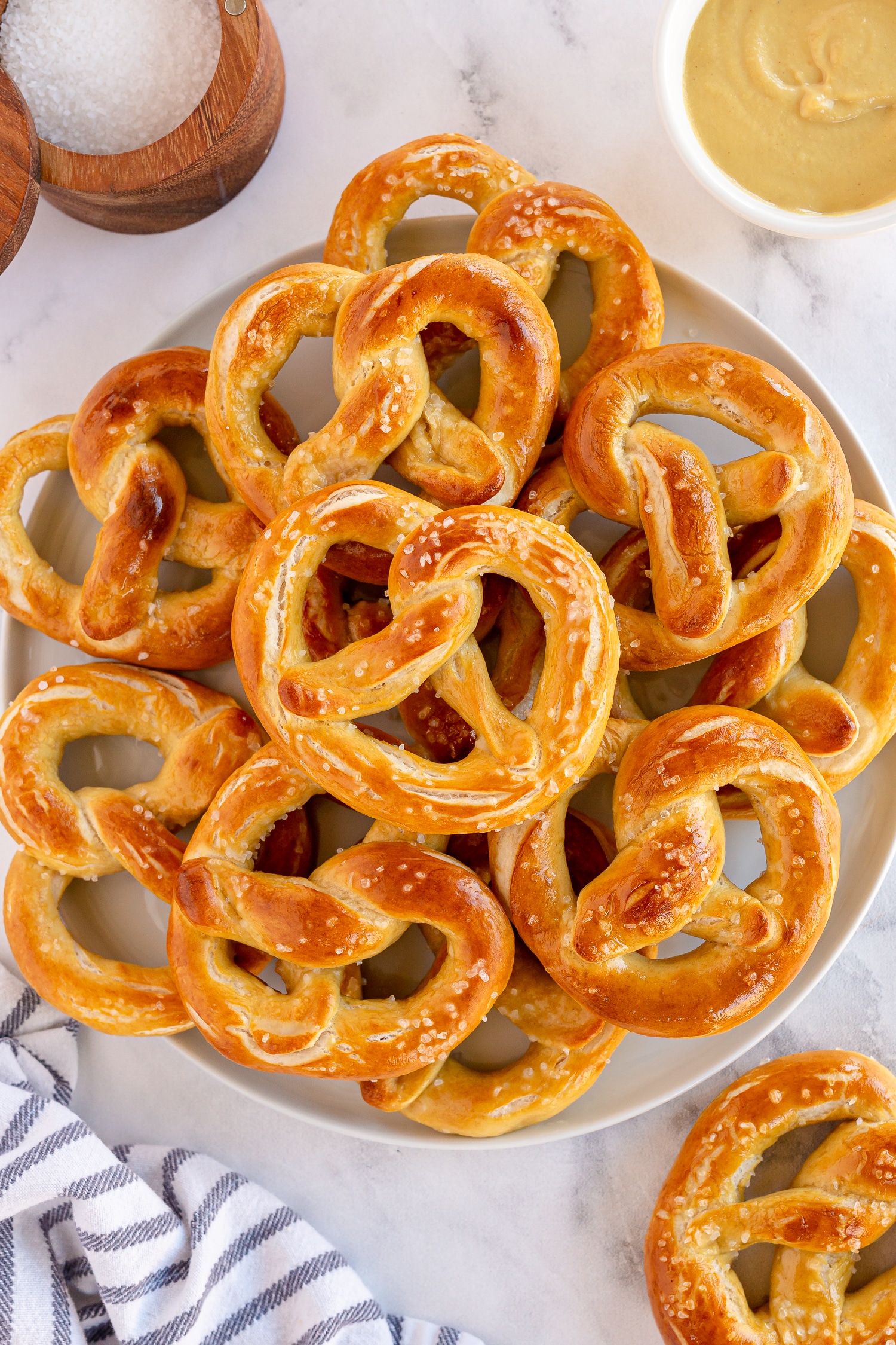 soft pretzels on a white platter