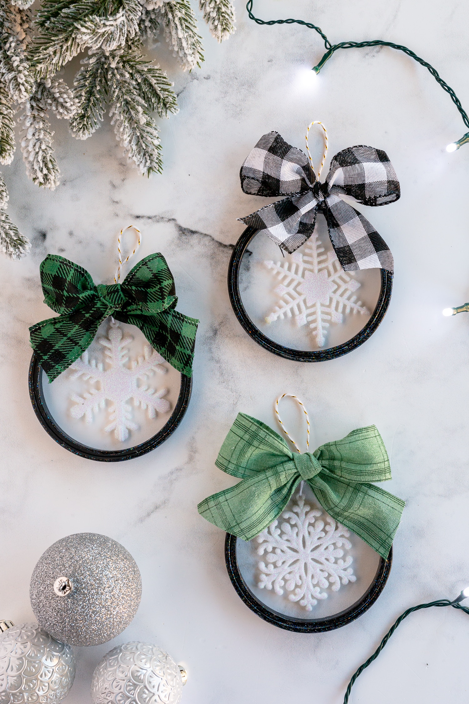 hoop ornaments with ribbon and plastic snowflakes