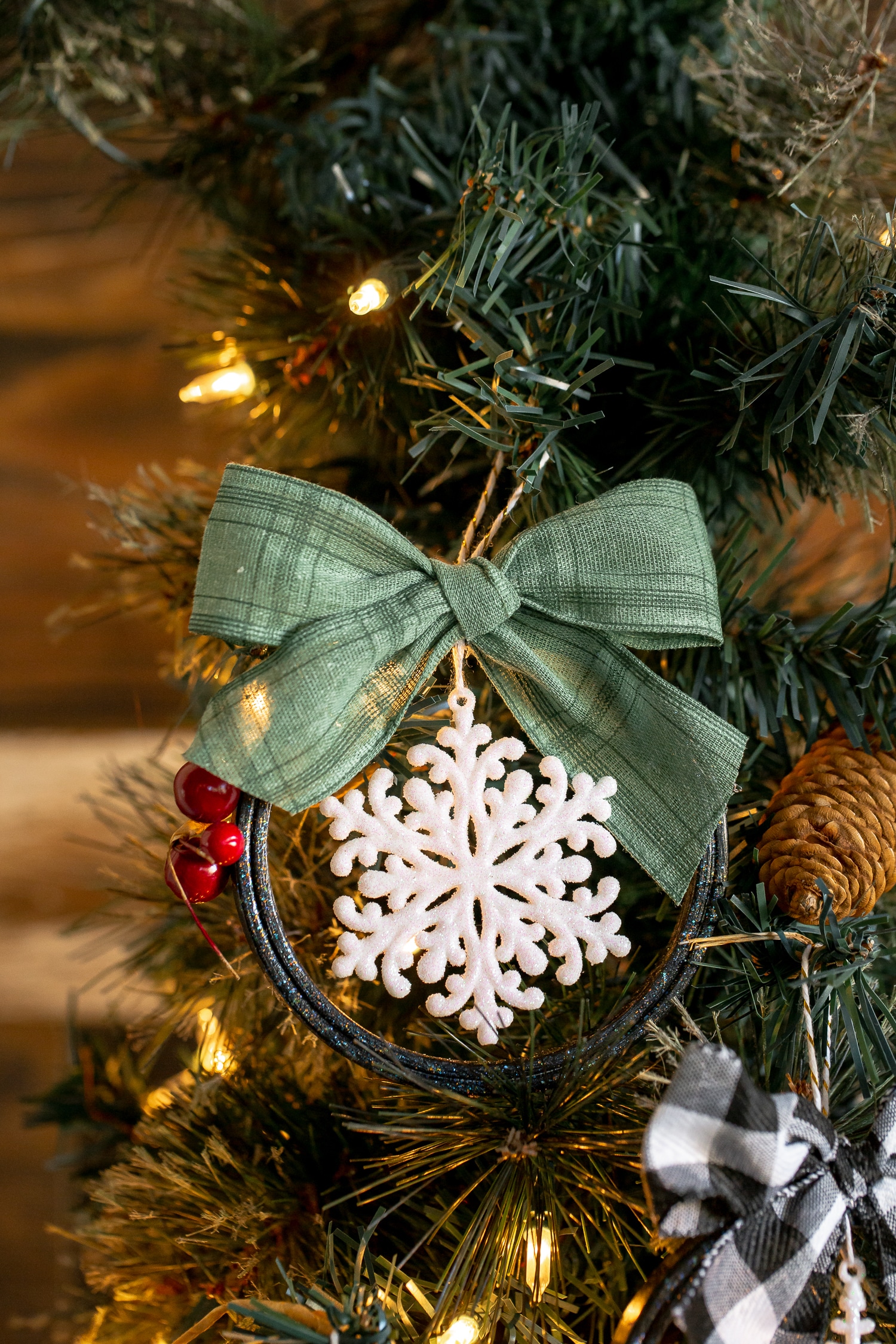 snowflake ornaments in embroidery hoop