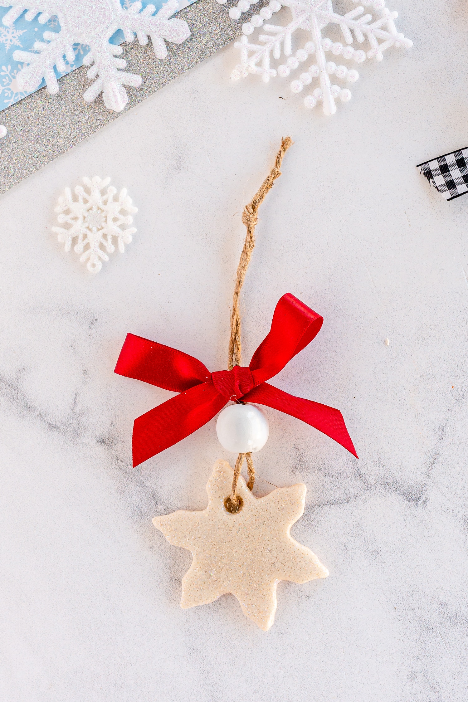 salt dough ornament with red ribbon
