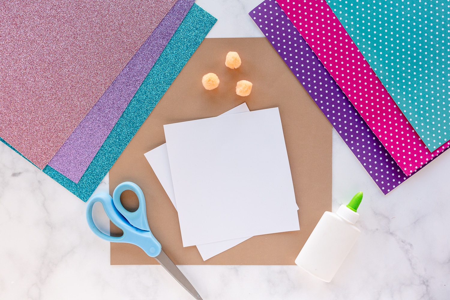 supplies needed for gnomes: cardstock, glitter paper, pom poms