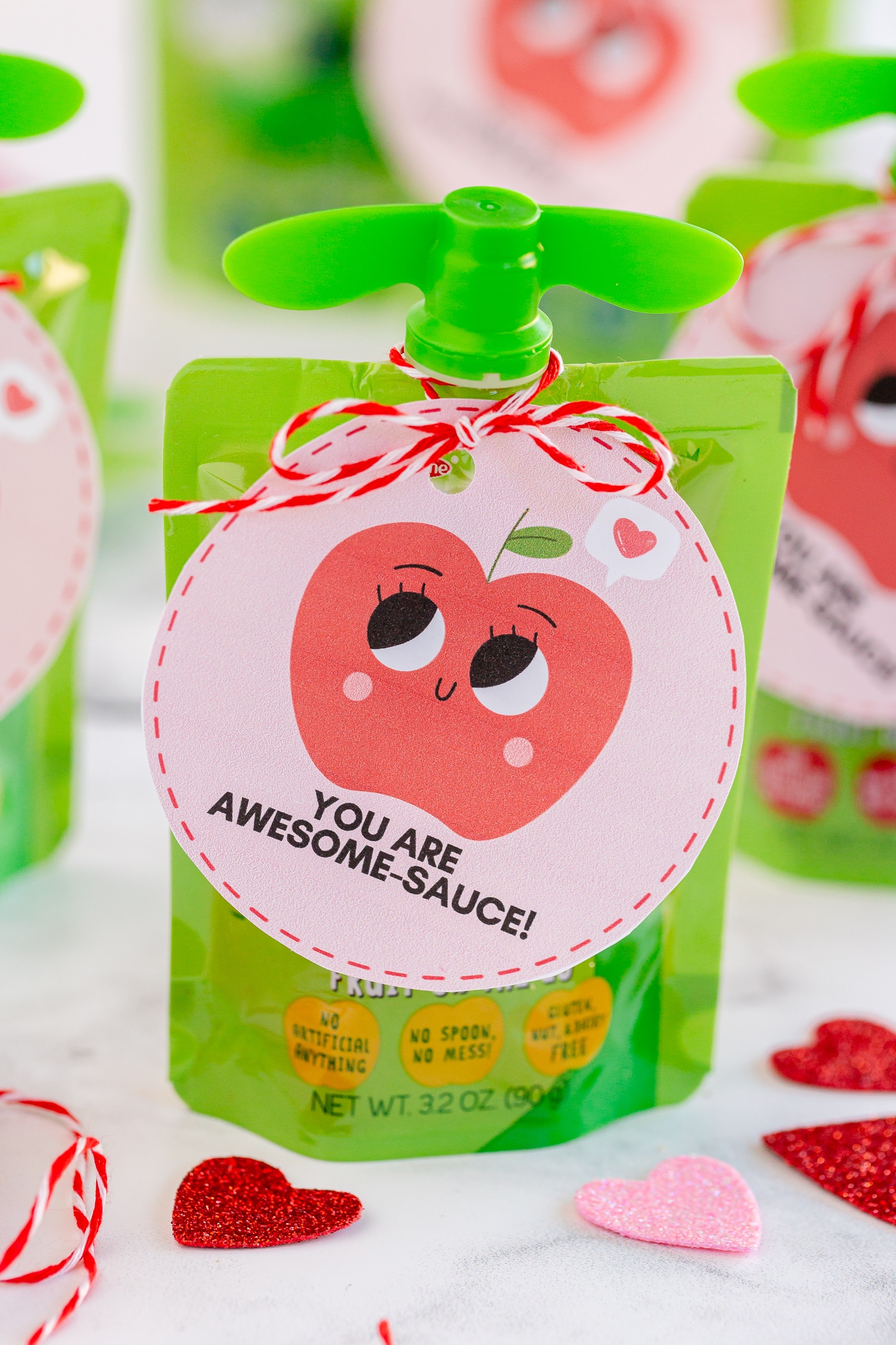 applesauce valentine's day gift tag attached to pouch