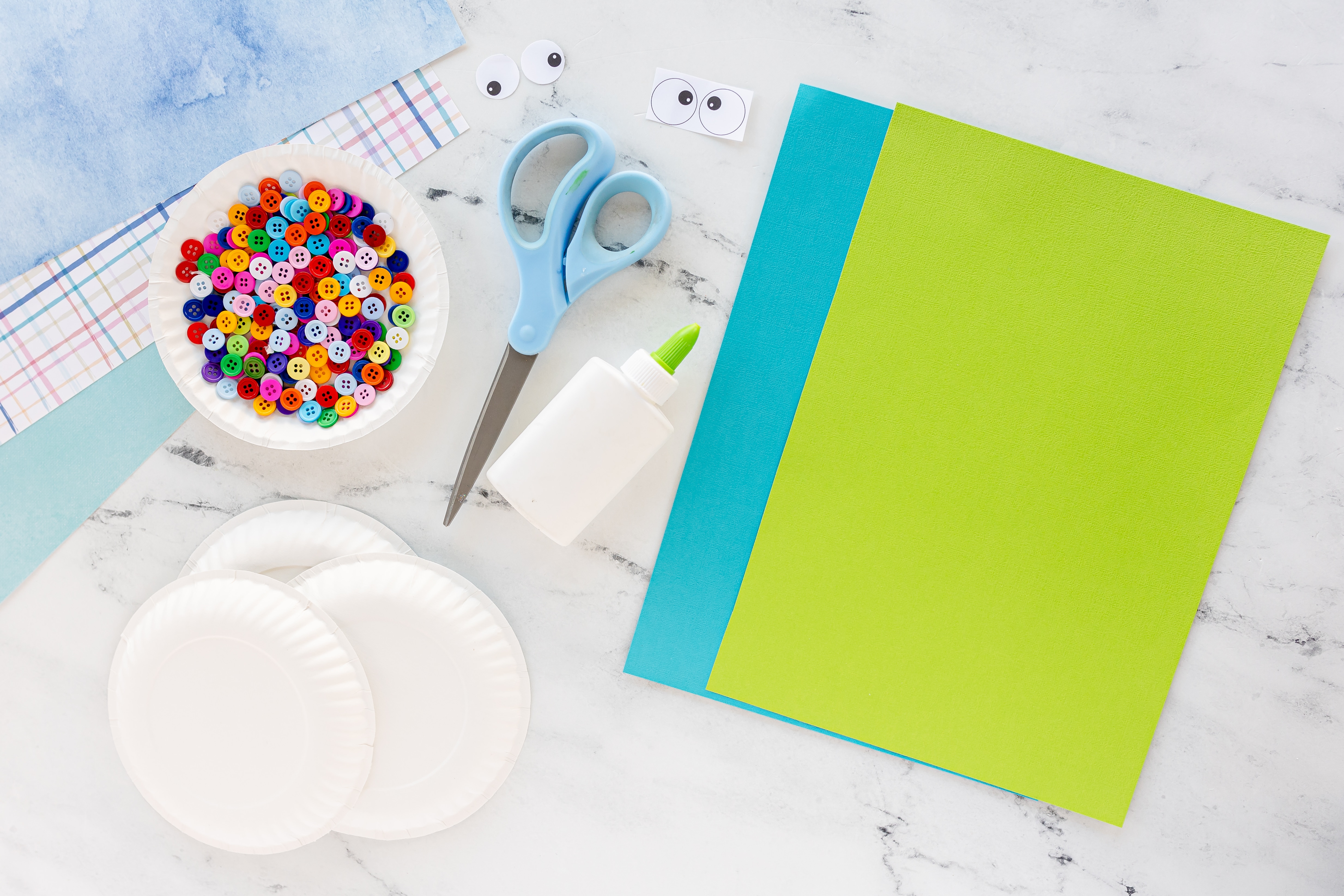 supplies needed for snail craft - paper, buttons, paper plate, eyes