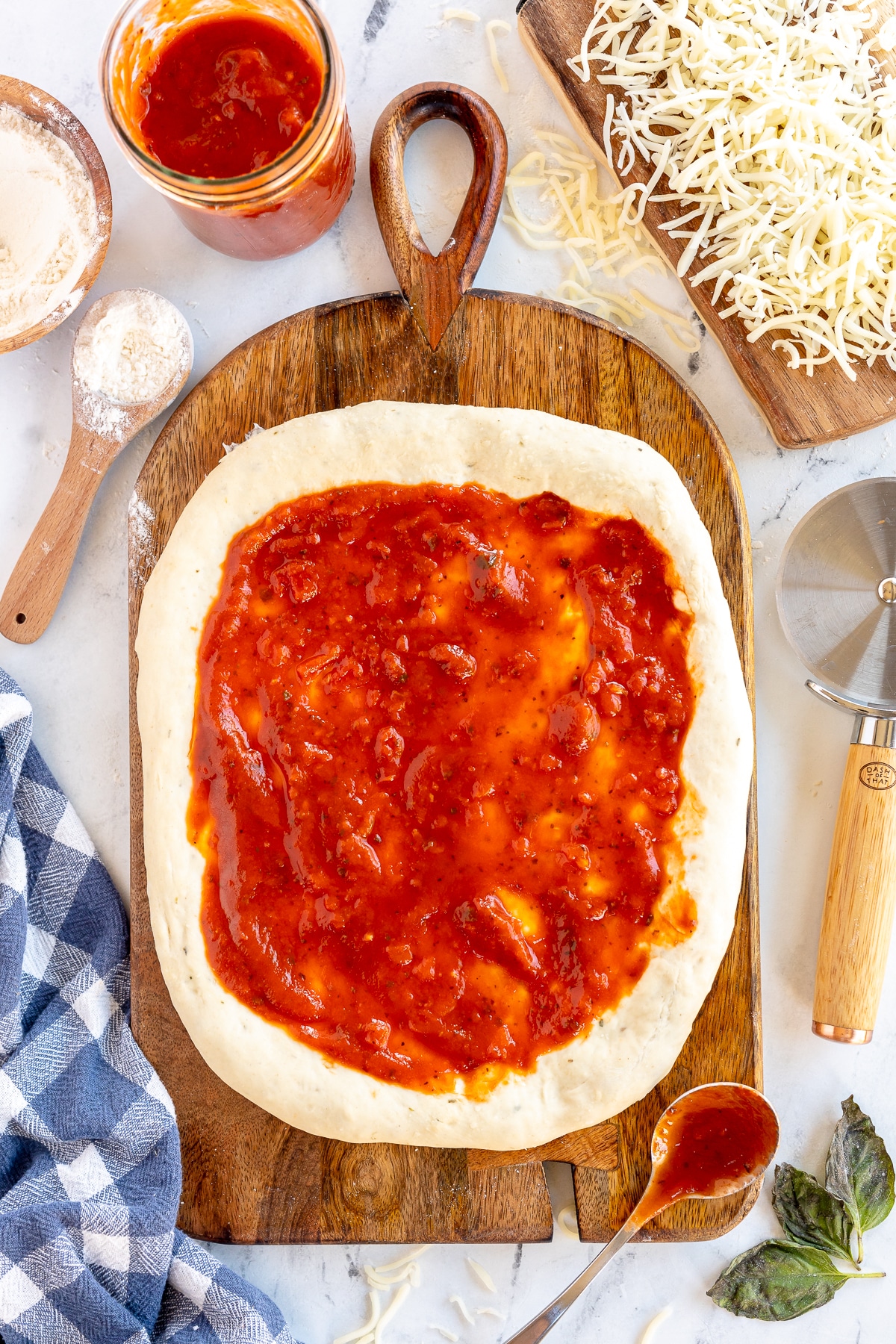 Pizza Dough Recipe with sauce on top