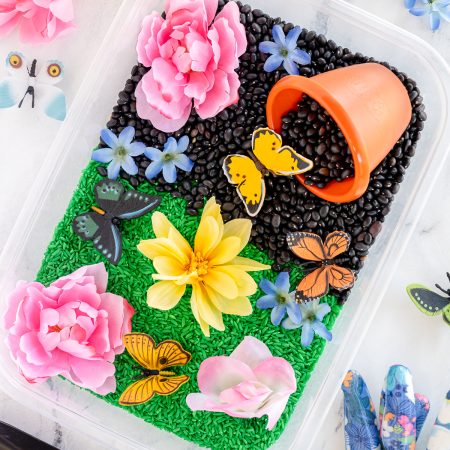 A garden sensory bin that kids will love to experiment with in the spring and summer. Perfect for kids ages three and up.