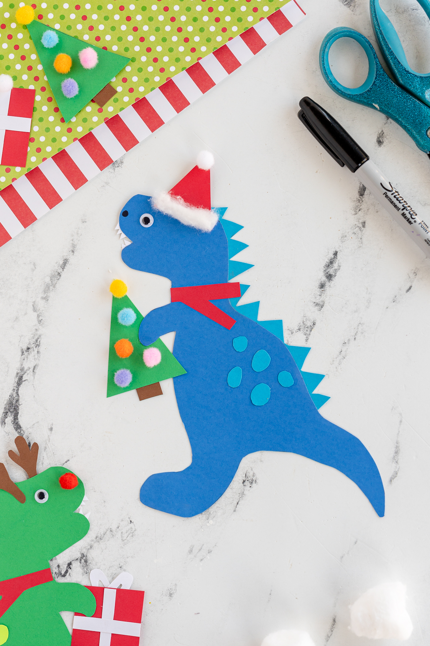 Cardstock Blue Christmas Dinosaur with Santa Hat and Christmas Tree