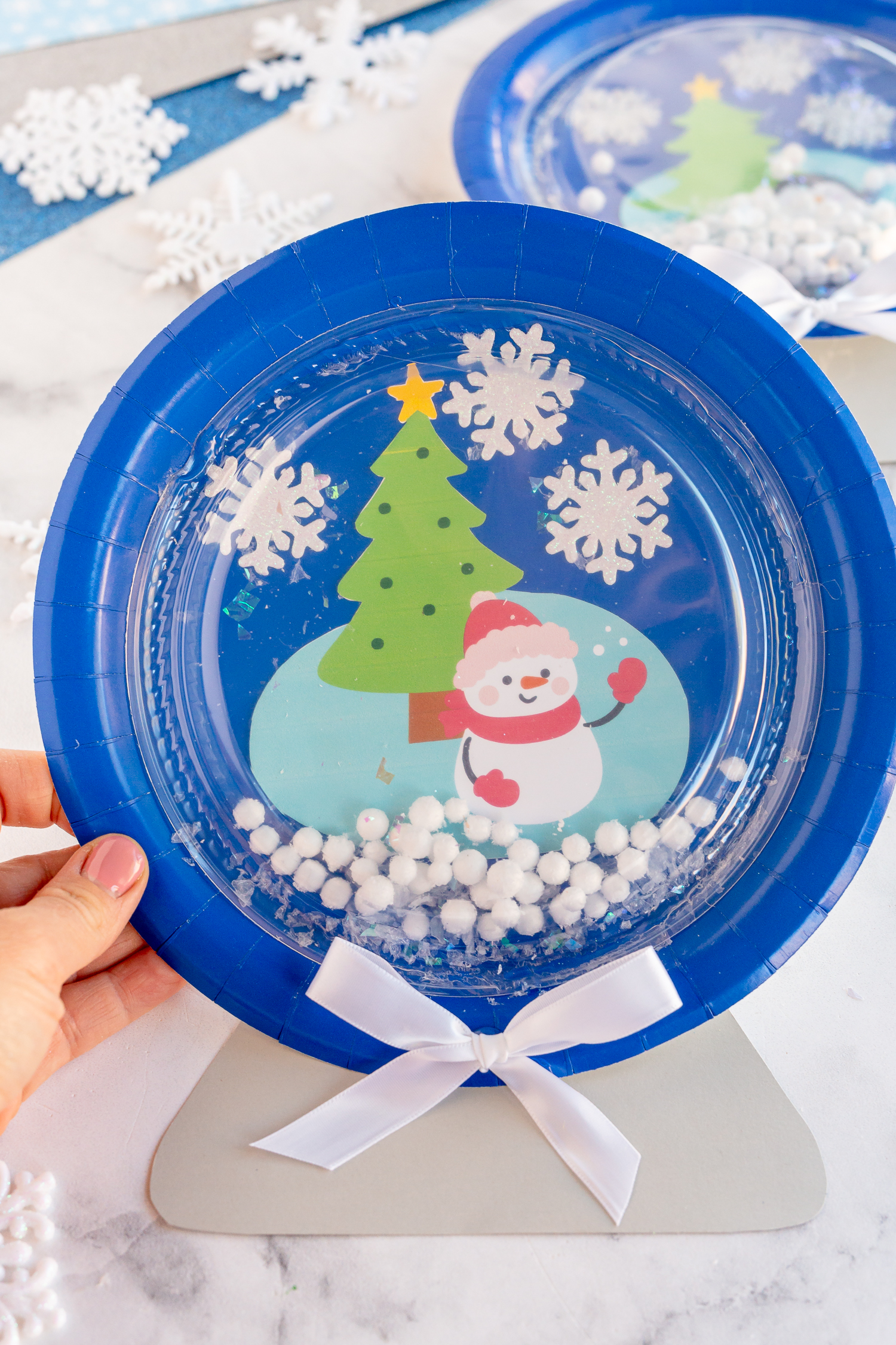 snowman clipart in paper plate snow globe