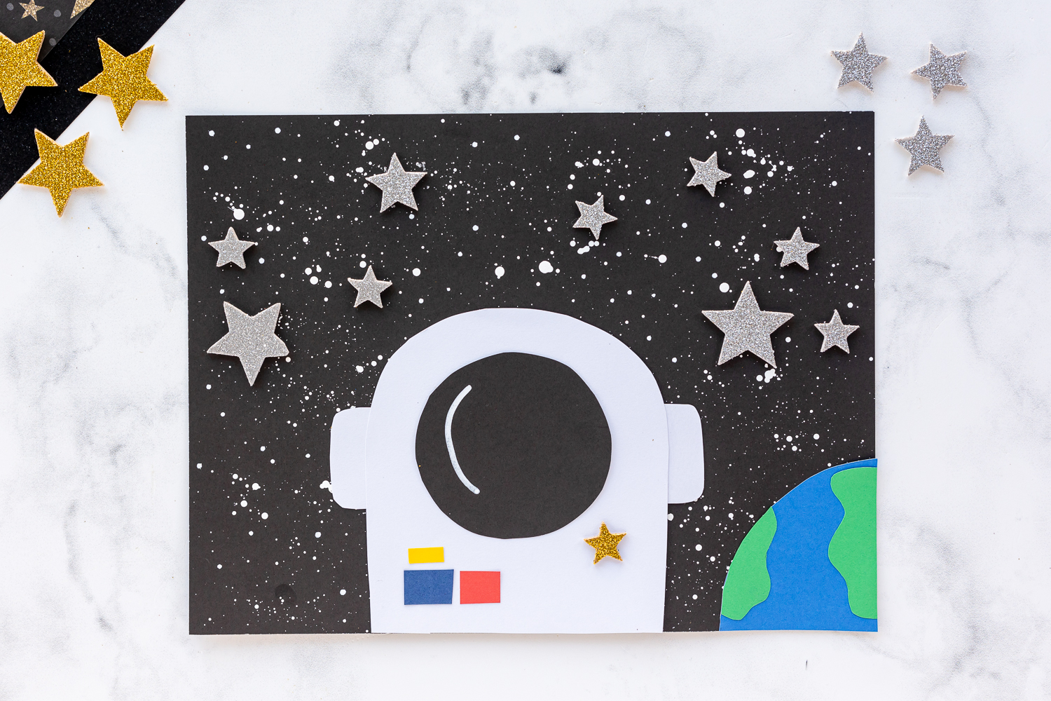 Astronaut Paper Craft for Kids finished on Counter