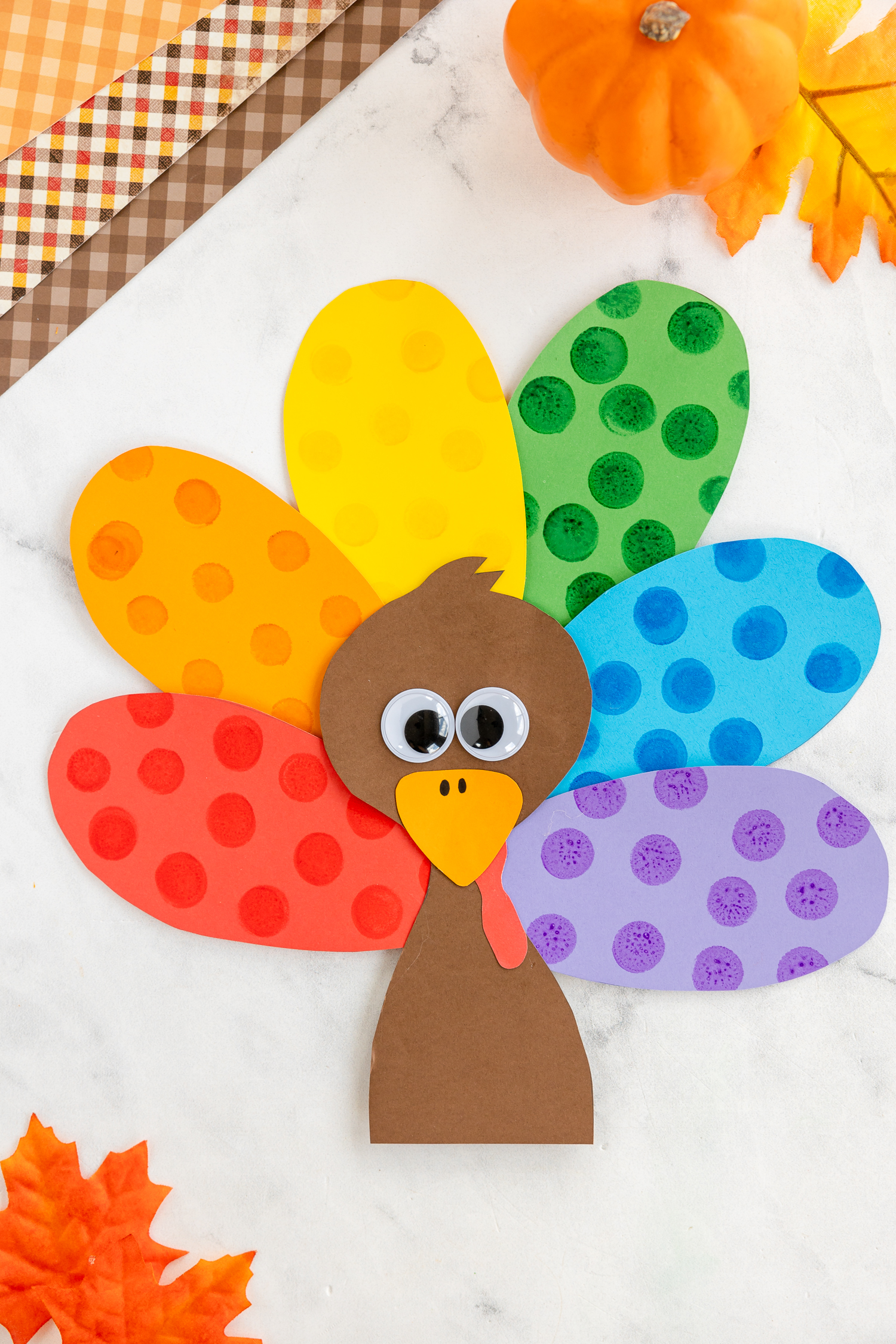  do a dot turkey with rainbow feathers on craft counter