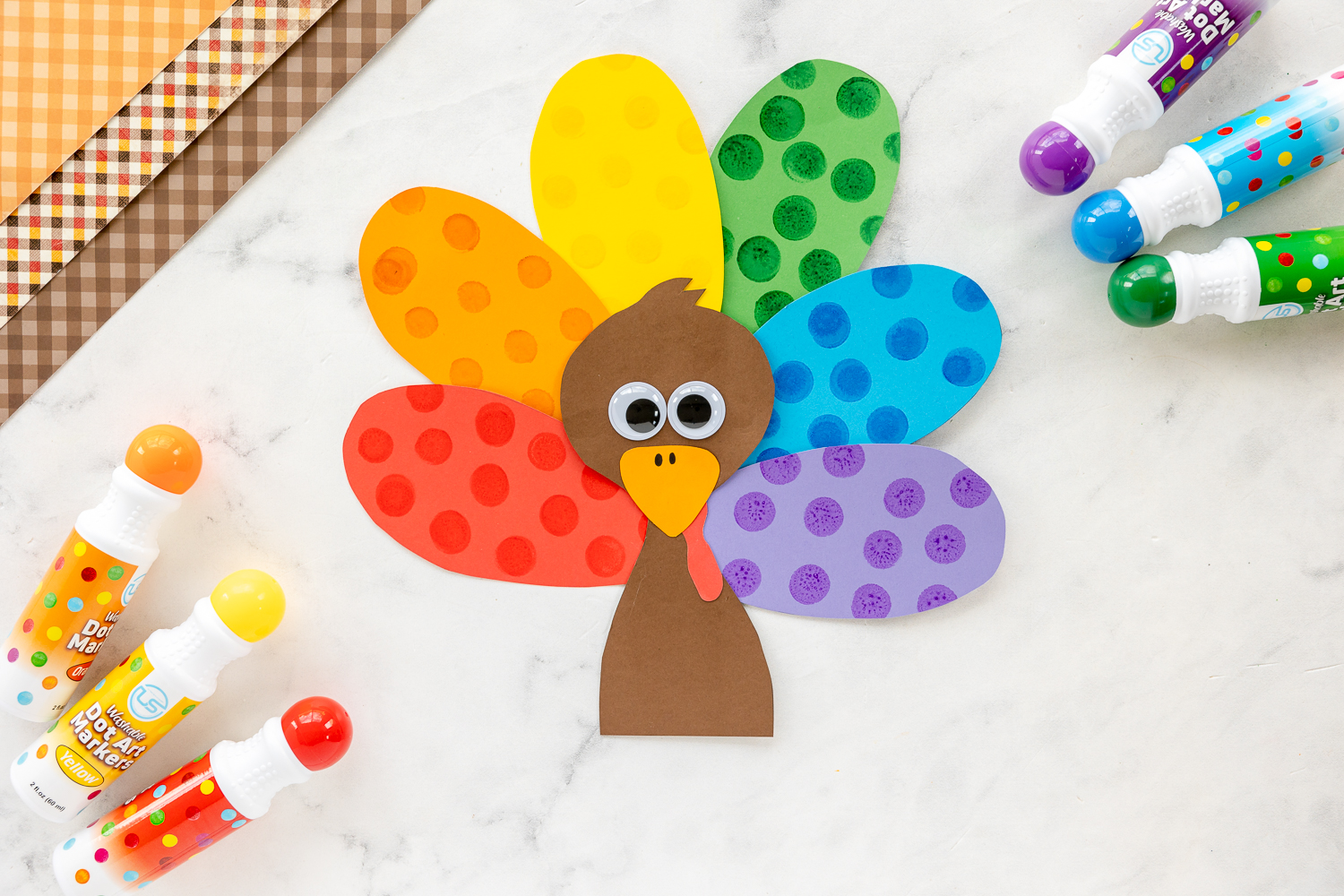 finished turkey  craft on counter with doo a dot markers