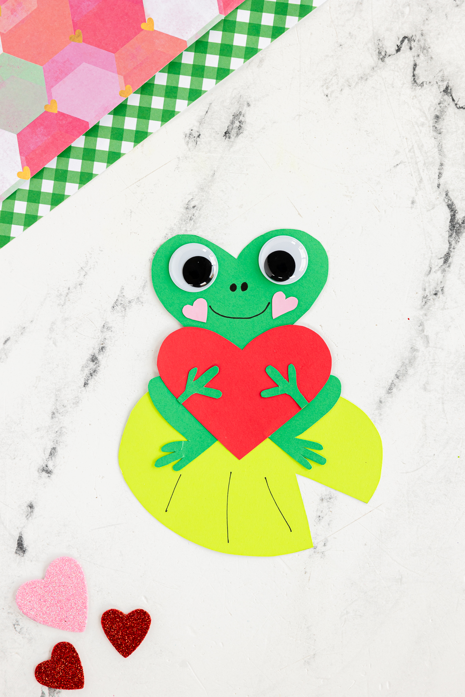 heart shaped frog craft on craft counter