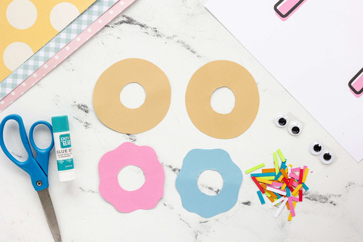 donut template pieces cut out on craft counter