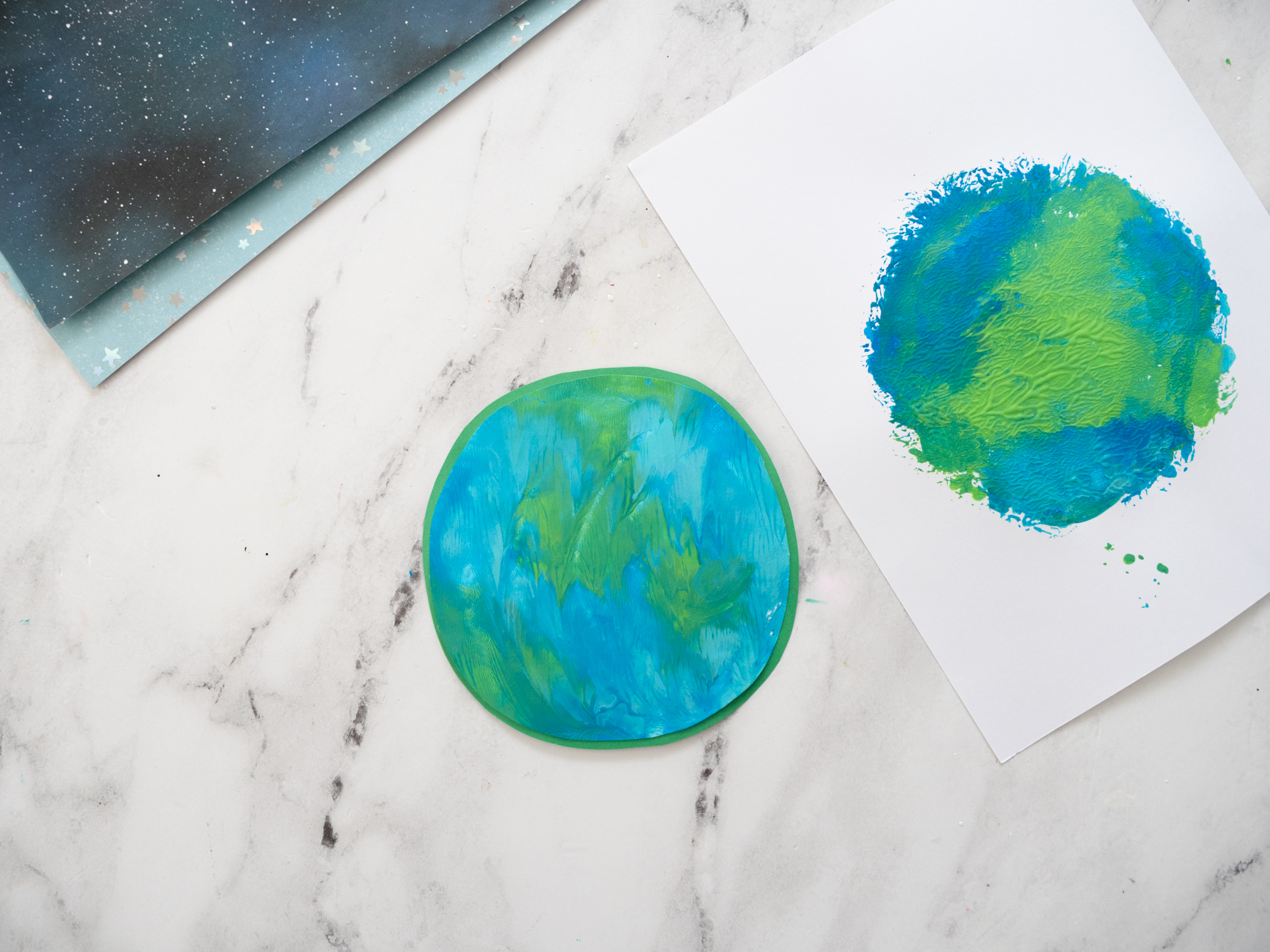 foil paint transfer technique for Earth Day craft