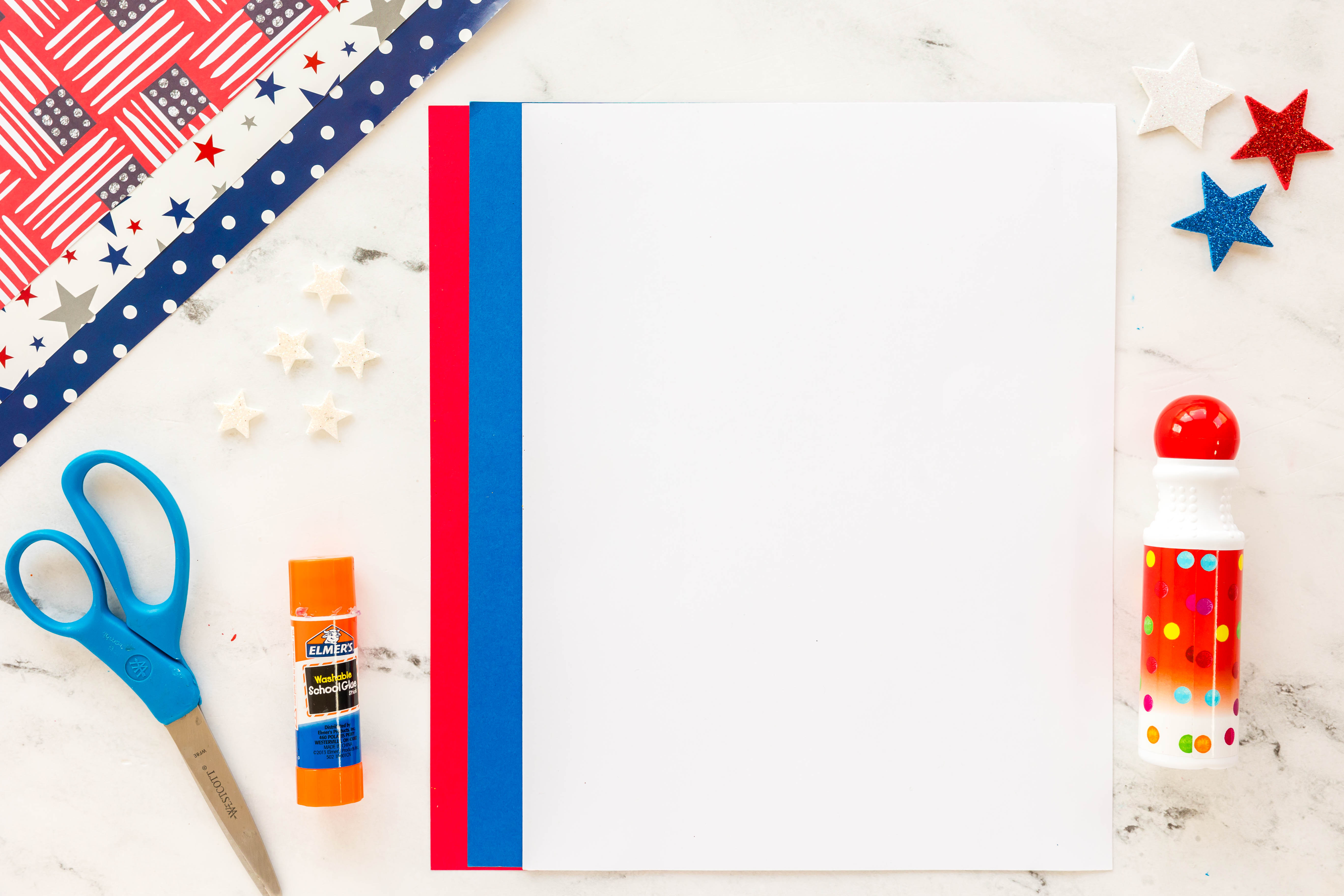 paper, stars and do a dot marker supplies on counter needed for handprint flag