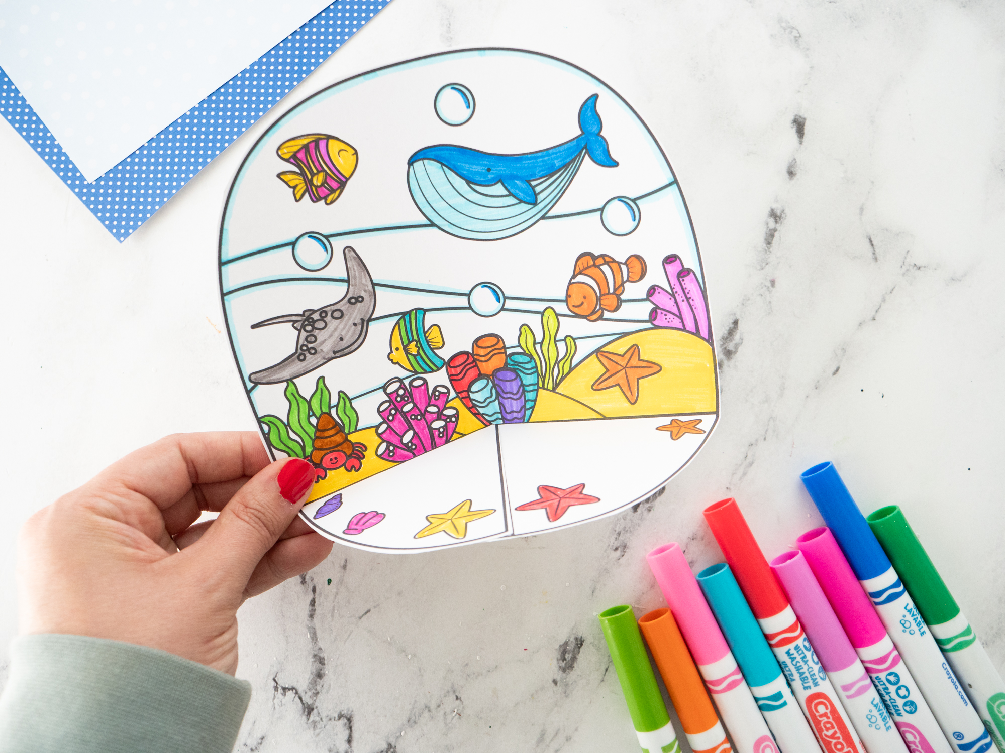 Fold and assemble the printable Ocean Diorama for Kids to create a colorful 3D underwater scene.