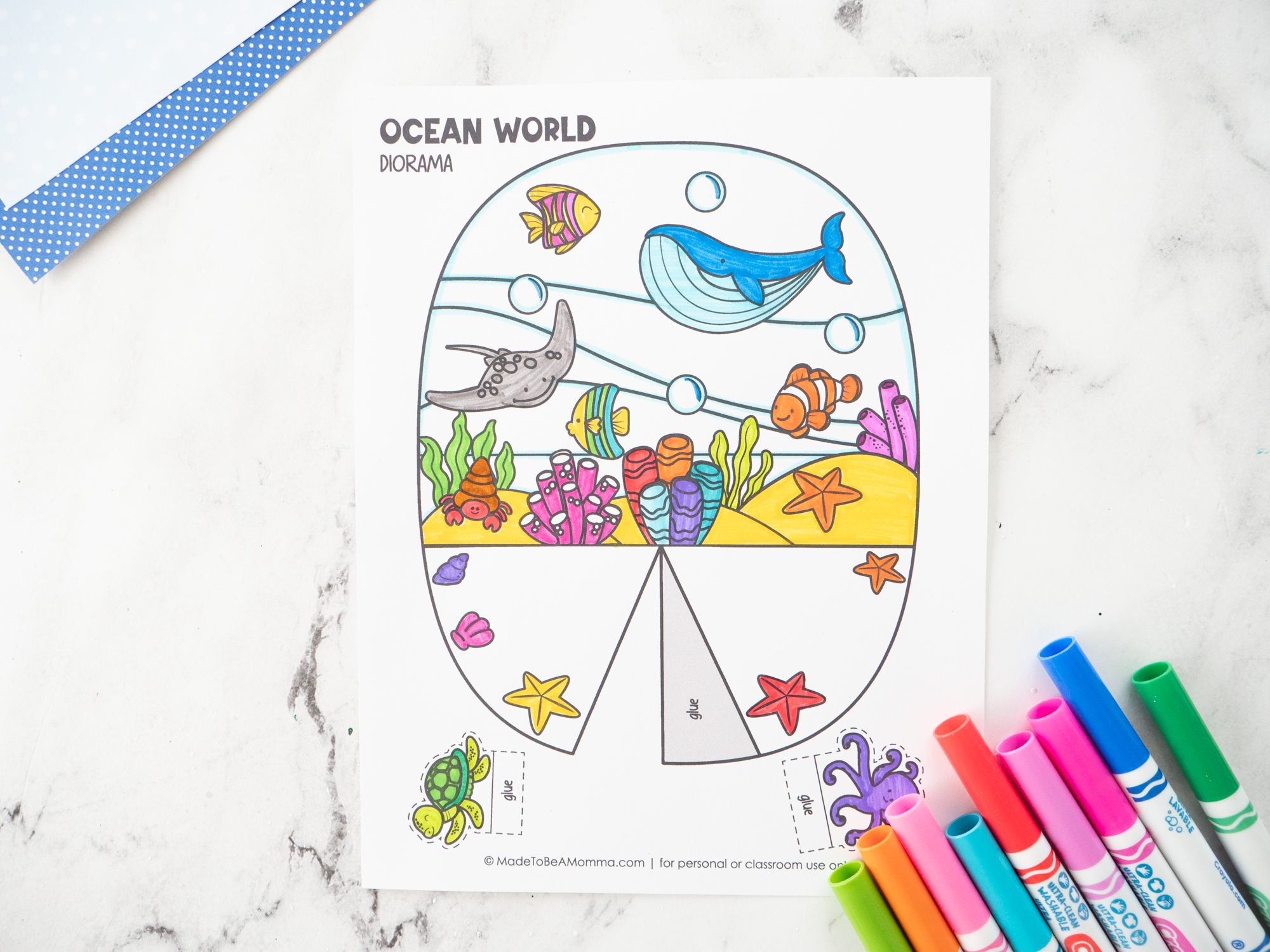 Color and cut out the printable Ocean Diorama for Kids and all of the ocean animal pieces.