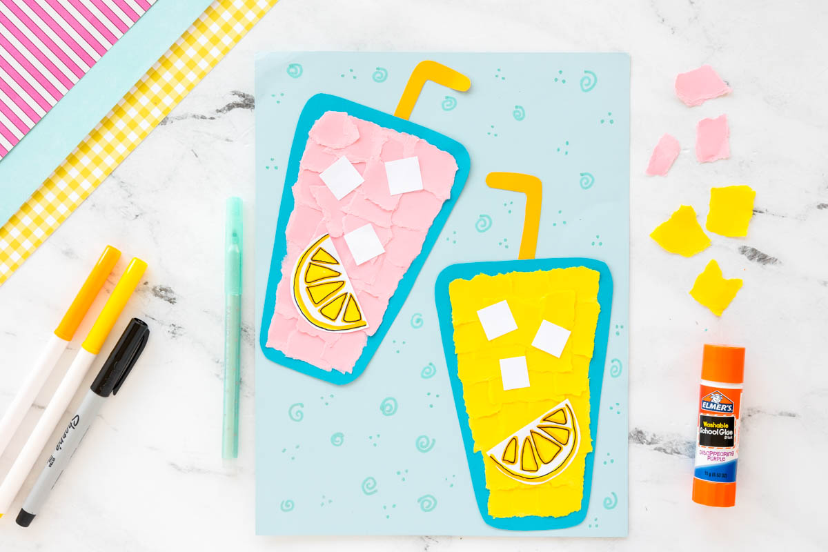 Gluing torn paper pieces inside a lemonade glass template to create a colorful summer craft