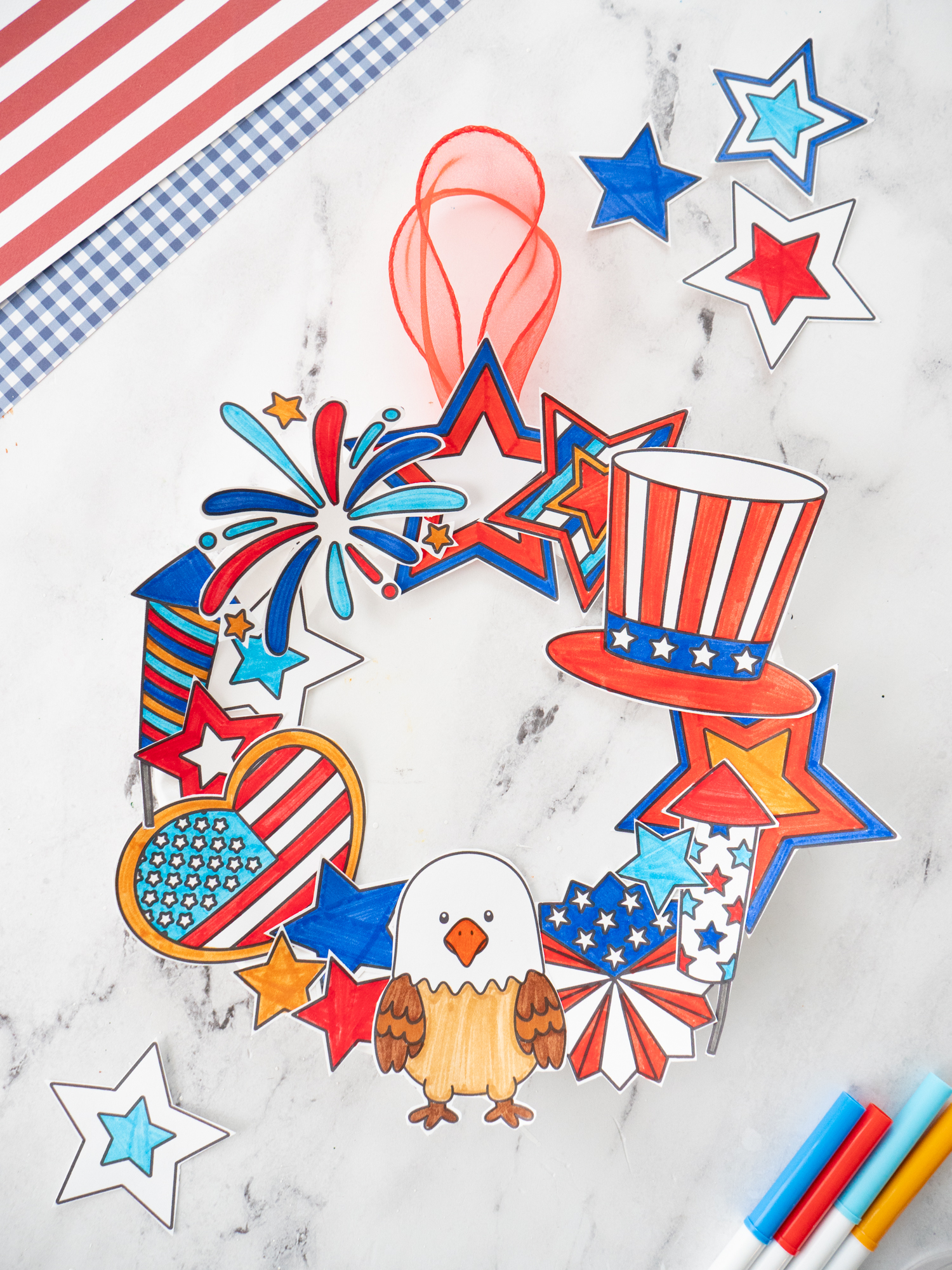 Finished printable Fourth of July wreath craft made with patriotic printable decorations and a paper plate